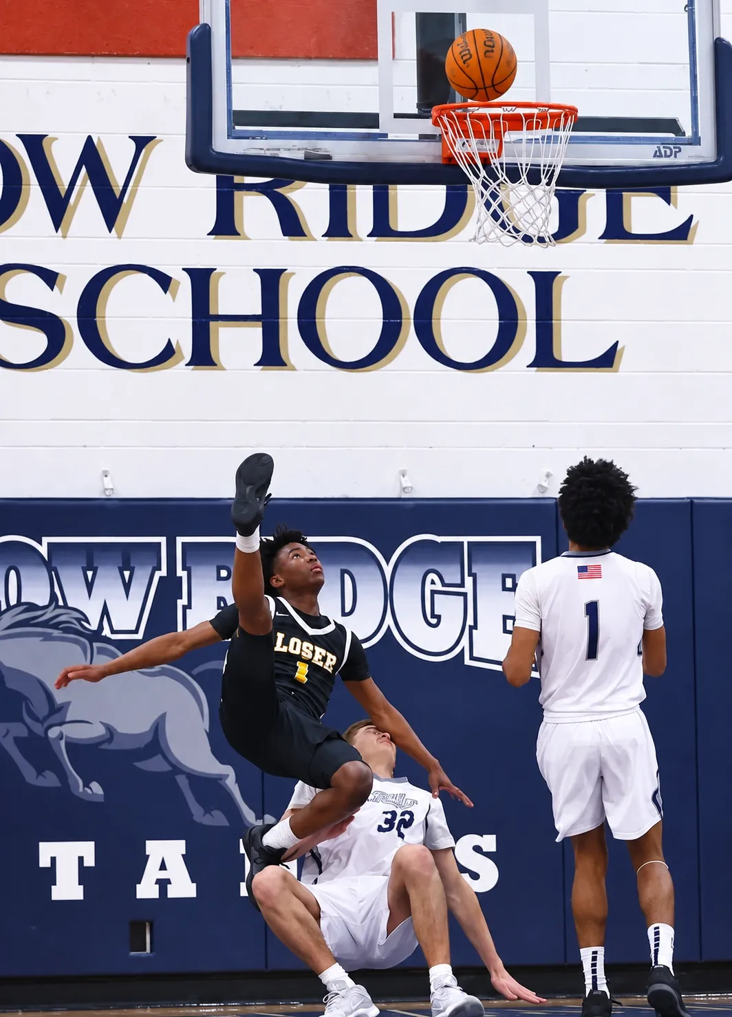 DJ Hunter leaping at the rim